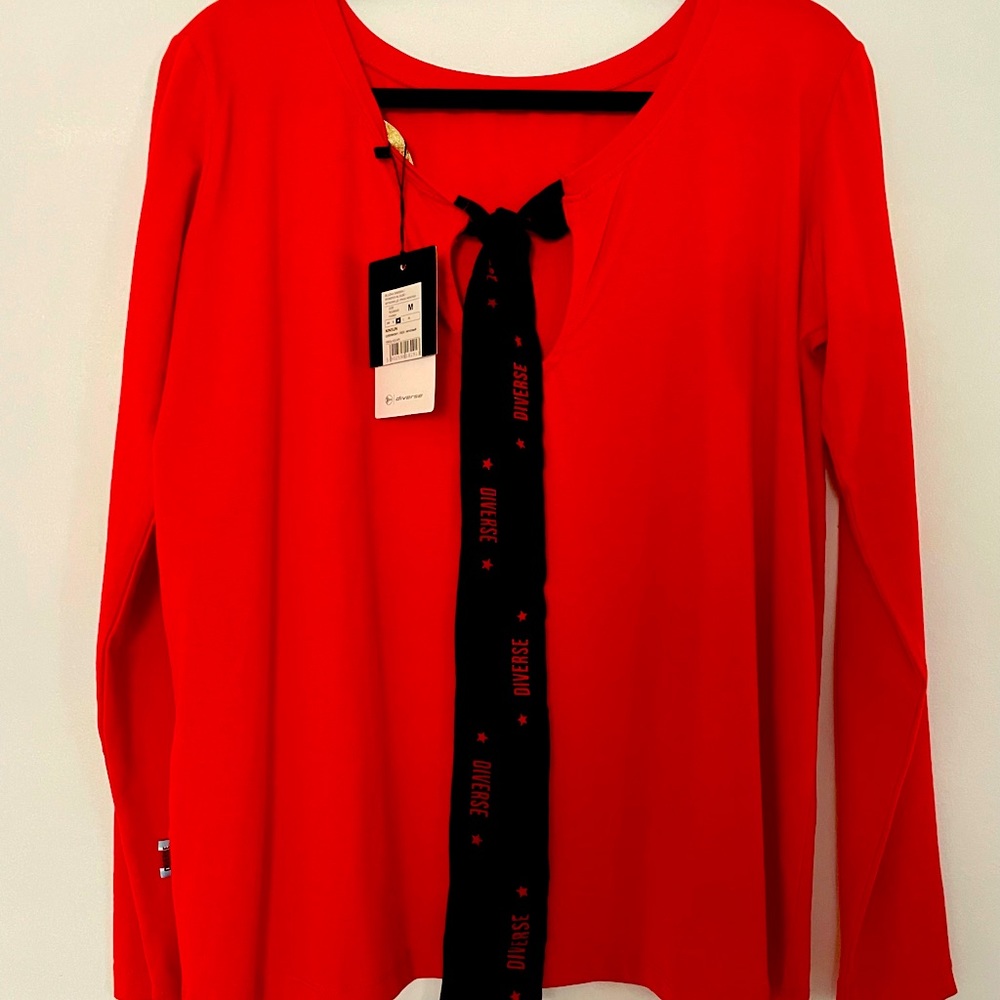 Beautiful blouse by diverseclothing.com